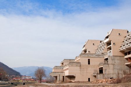 Apartment house under construction from concrete with blue skyの写真素材