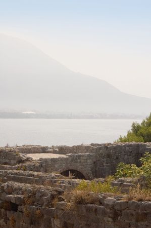 Shot of part of ruins castle on beach of sea Adriaticの写真素材