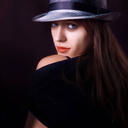 Portrait of a young sensual fashion woman with hat     