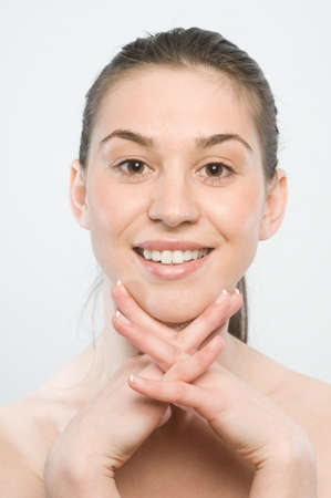 Portrait of a young, beautiful caucasian woman on white