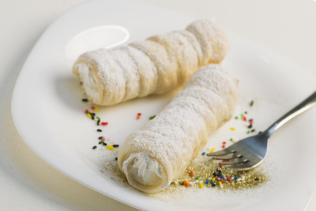 Sweet roll cakes served on plate