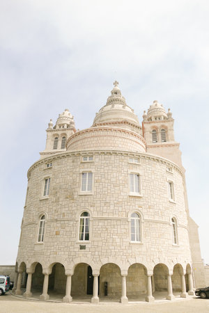 Portugal, Viana Do Castello, Church of the Sacred Heart of Jesus Santa Luzia. The âSacred Heartâ, the Saint Lucia basilica (basilica de Santa Luzia), named after Saint Lucia, patron saint of the eyes. The neo-Byzantine style building is preceded by a のeditorial素材