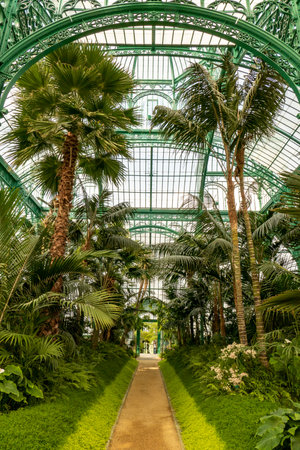 Brussels, Belgium, May 4, 2022. Royal Greenhouses of Laeken, Royal Castle of Laeken.Classical style greenhouses designed by Alphonse Balat in 1873 with pavilions, domes and galleries.のeditorial素材