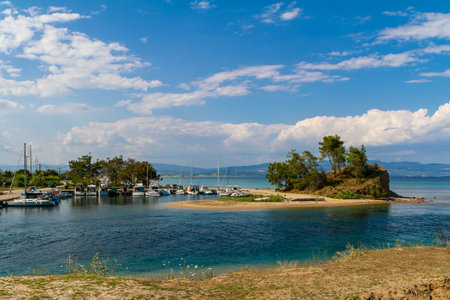 Nea Potidea, Greece, July 10, 2022. Port of the village of Nea Potidea or Nea Poteidea in Kassandra peninsula, Chalkidiki, Greeceのeditorial素材