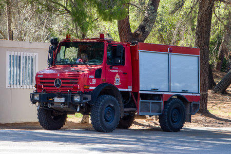 Epidaurus, Greece, July 17, 2022, Fire truck in prevention of a fire at the archaeological site of Epidaurus.のeditorial素材