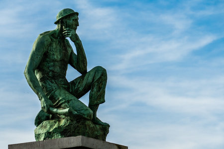 Charleroi, Belgium, November 11, 2022. The Crouching Miner located is a monument dedicated to Labor, designed by Constantin Meunier.のeditorial素材