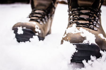 Boots on a snowの写真素材