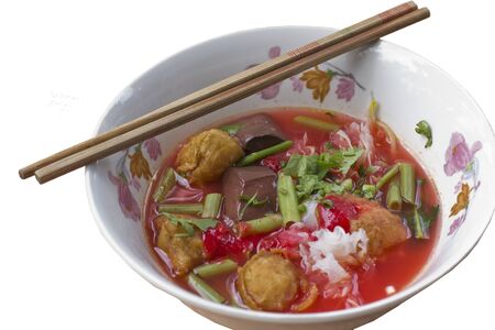 Yentafo  Rice noodles in pink broth with fishballs, squid, fried tofu and kang kung 