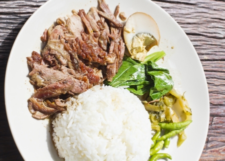 Thai stewed pork knuckles with riceの写真素材
