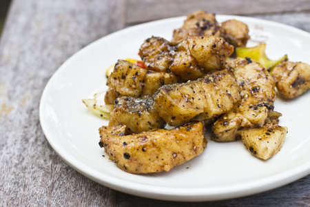Stir fried barracuda in black pepper sauce