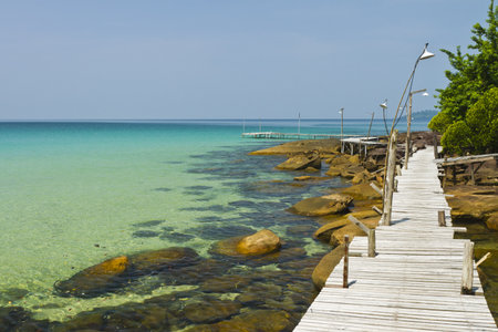 Wooden bridge on the coast of Kood island in Thailandの写真素材