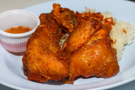 Thai fried chicken and sticky riceの写真素材