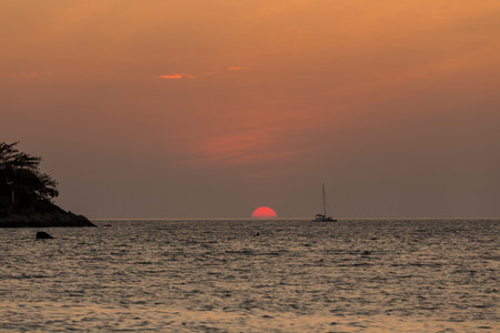 Sunset at Sunset Beach in Lipe island, Thailandの写真素材