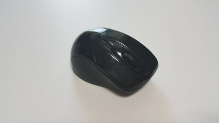 A black wireless mouse
