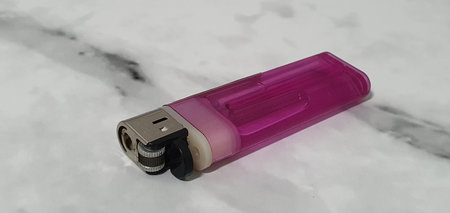 a disposable lighter used for smoking.