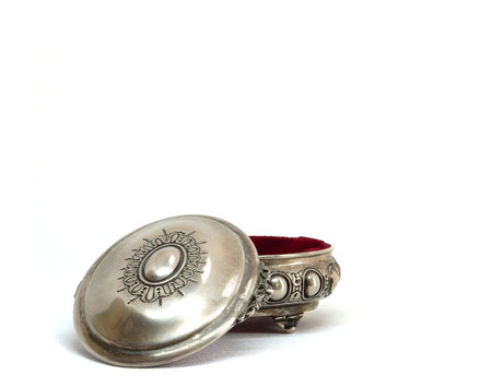 Open silver jewelry box with red velvet inner side.Isolated on white. High quality photo