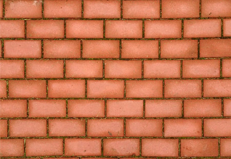 abstract geometric background paved with red brick, selective focus