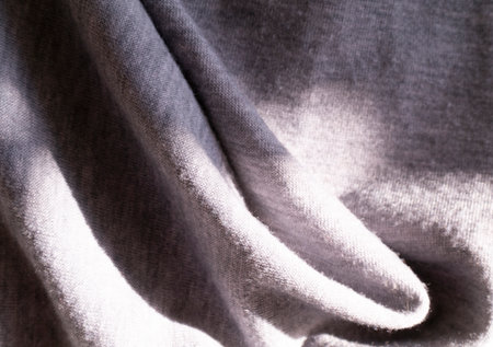 Abstract textured gray textile knitted background, Deep pleated fabric, selective focus. High quality photoの写真素材