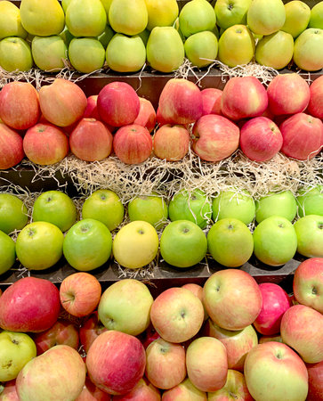 Natural background of green and red apples in the store. High quality photo