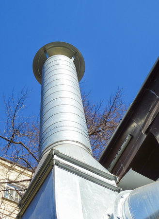 White metal pipe against the blue sky, selective focusの写真素材