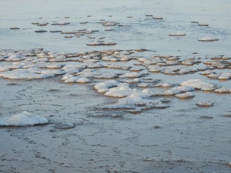 floating ice on the winter Baltic Sea on a sunny day