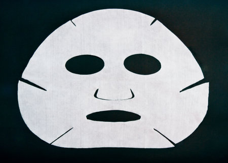 cosmetic mask on a black background の写真素材