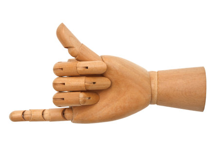 Wooden hand isolated on a white background の写真素材