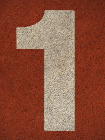 Numbers on red running track の写真素材
