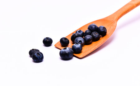 sweet blueberry in white backgrounの写真素材