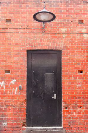 Vintage door behind the pubの写真素材