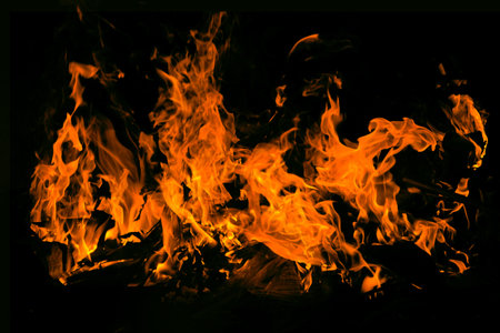 fire isolated over black backgroundの写真素材