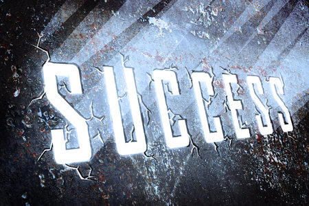  text "success" shape hole on wall with the light shining outの写真素材