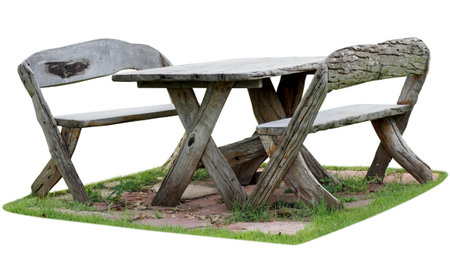 Picnic table outside on a grass isolated on white backgroundの写真素材