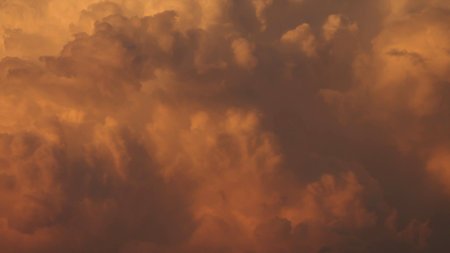 Texture of sunset cloud sky in warm colorの写真素材