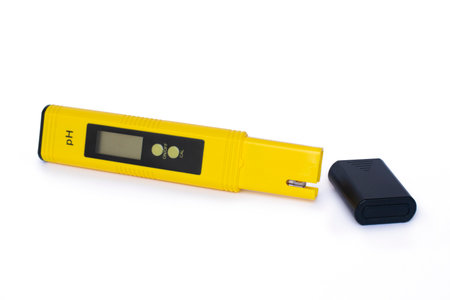 Electronic pH meter tester pen on a white background.の写真素材