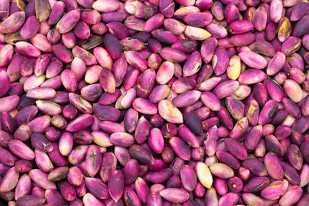 Heap of fresh pistachios in shellの写真素材