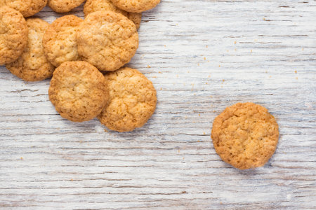 Oatmeal cookies on a light wooden backgroundの写真素材