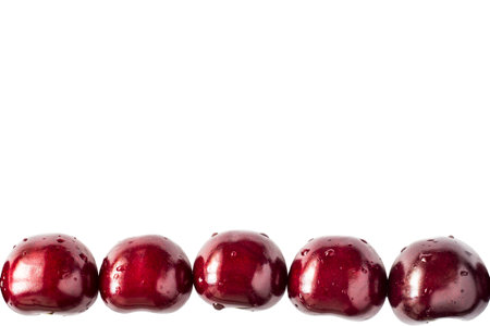 Set of beautiful red cherry isolated on white background. For backgroundの写真素材
