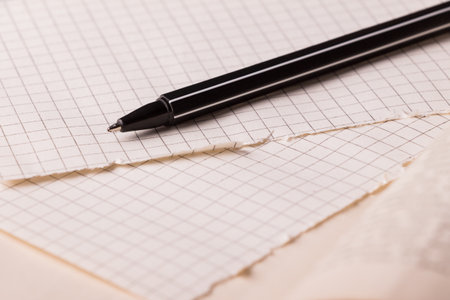 Pen and pages in cage. Concept of education.の写真素材