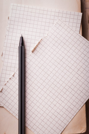 Pen and pages in cage. Concept of education.の写真素材