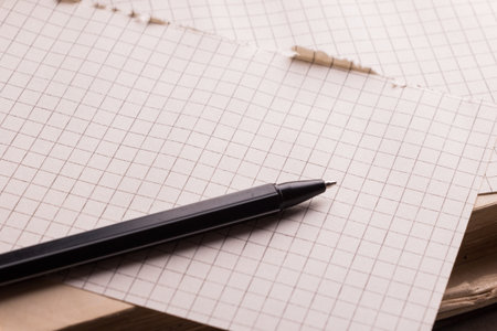 Pen and pages in cage. Concept of education.の写真素材