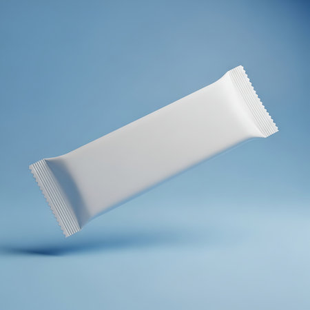 Blank white food bar wrapper mockup floating on a blue backgroundの素材