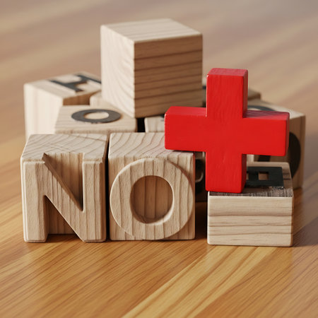 Wooden blocks spelling no next to a red plus sign symbolの素材