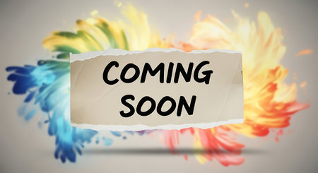 Coming soon announcement on torn paper with colorful paint splashの素材
