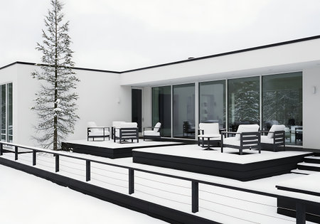 Modern minimalist house exterior with outdoor patio covered in snowの素材