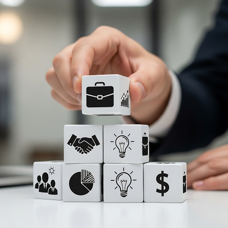 Businessman stacking wooden block with briefcase icon for career growthの素材