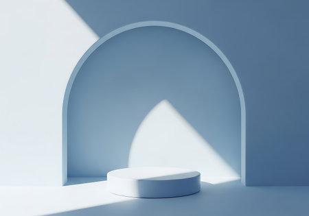 Minimalist light blue podium with arch shadow for product displayの素材