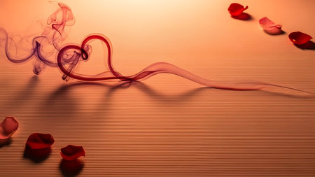 Abstract heart shape formed by smoke or liquid trail on warm wooden surface with petalsの素材