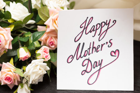 Mothers day card with rustic roses on wooden board