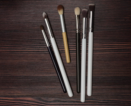 set brush on a dark wooden backgroundの写真素材